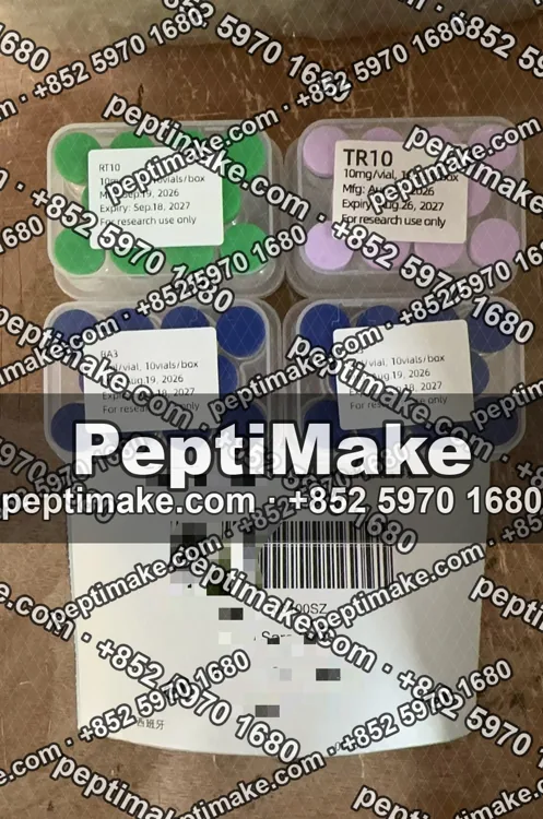 Kits with the courier label laid beside them, details masked